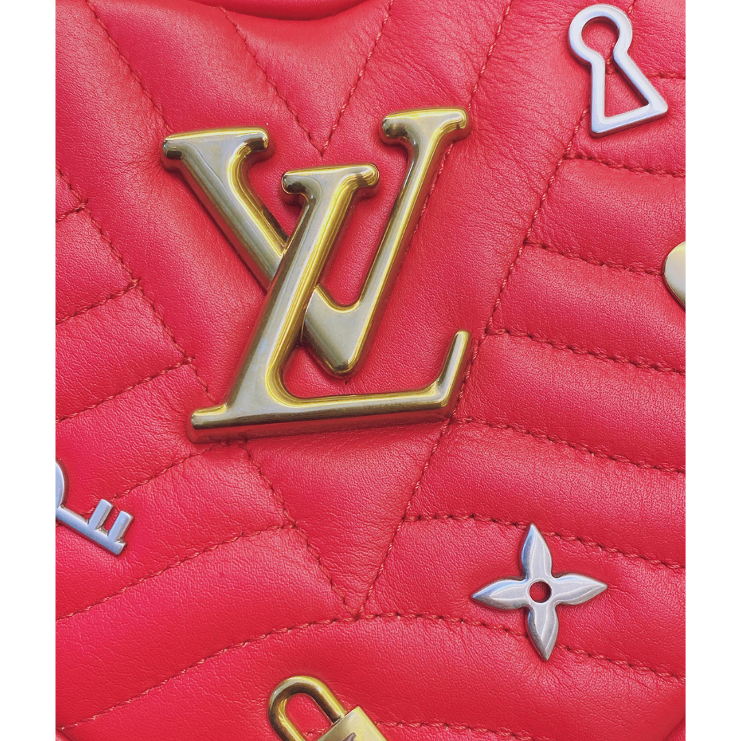 LOUIS VUITTON - RED QUILTED LEATHER LOVE LOCK HEART